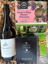 Load image into Gallery viewer, Gift basket with wine, candles, sweets and chocolate presented in a gift box
