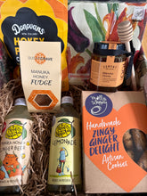 Load image into Gallery viewer, Assorted honey and ginger products in a box.
