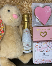 Load image into Gallery viewer, Scented candle, fluffy bunny, heart iced cookie, boxed coconut ice, small bottle of bubbly wine
